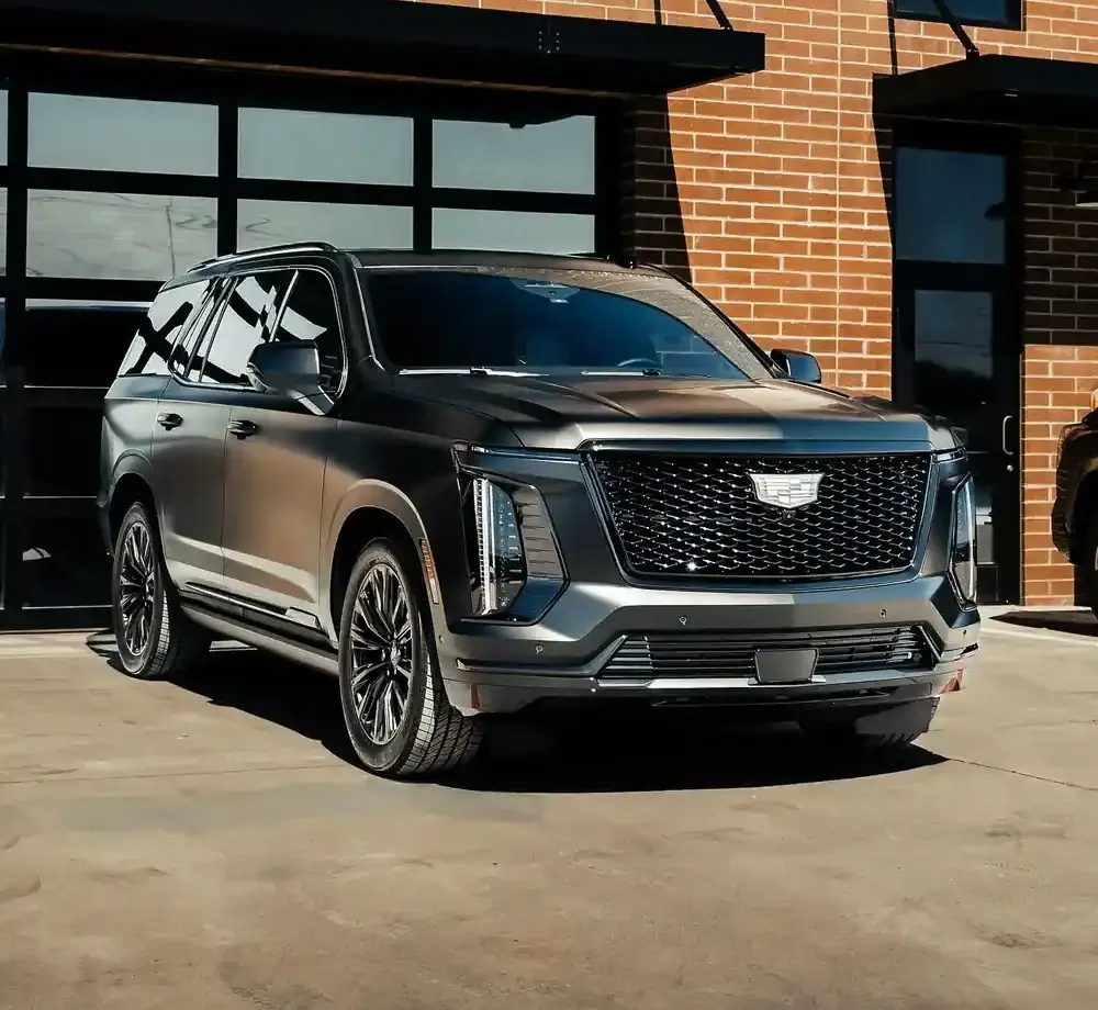 Black cadillac escalade, Paint Protection film keller package on the car.